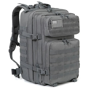 Gray 45L outdoor backpack with MOLLE-style gear storage, front pockets, compression straps, and removable flag patch.