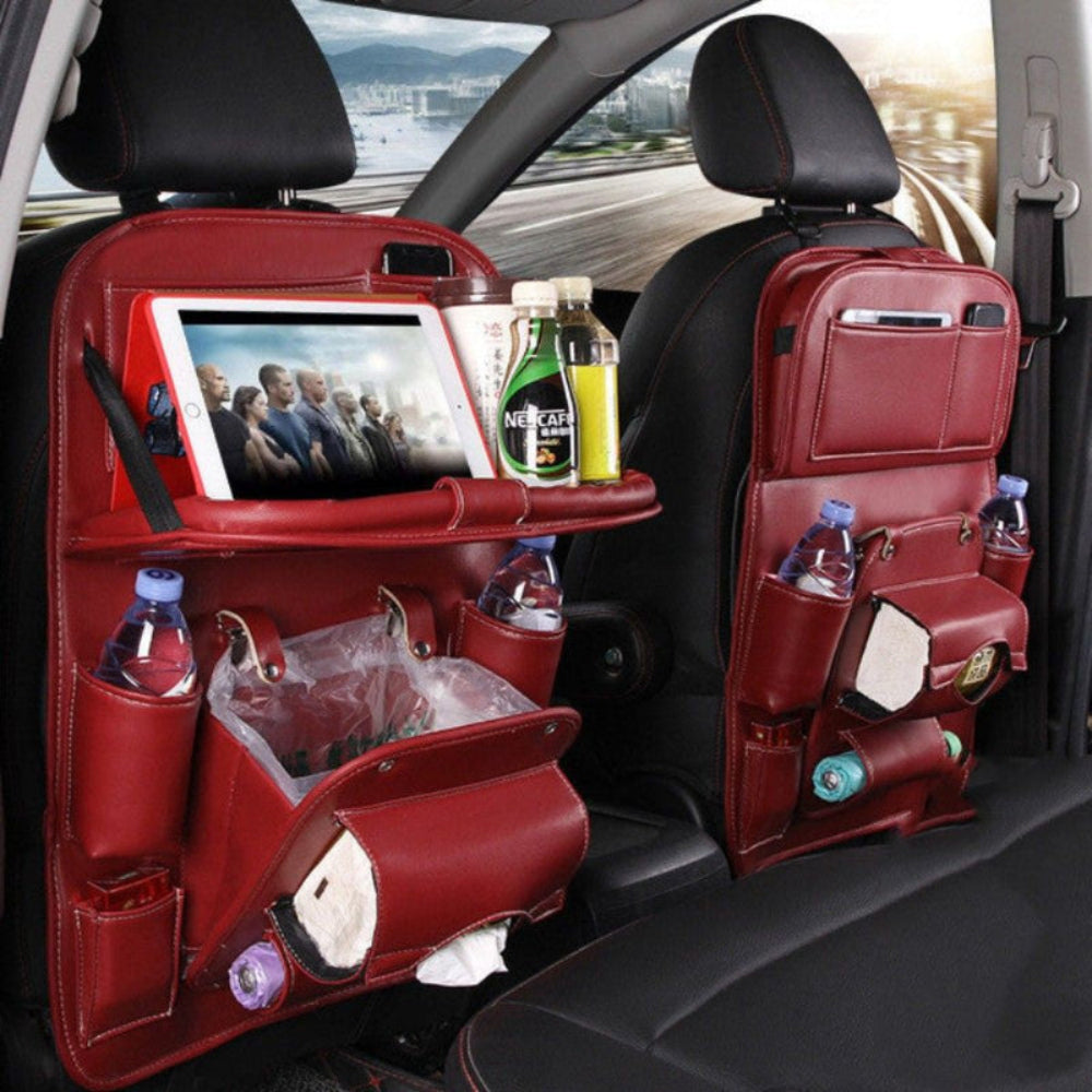 Wine red road trip seat-back organizer with folding tray, cup holders and tablet slot in car