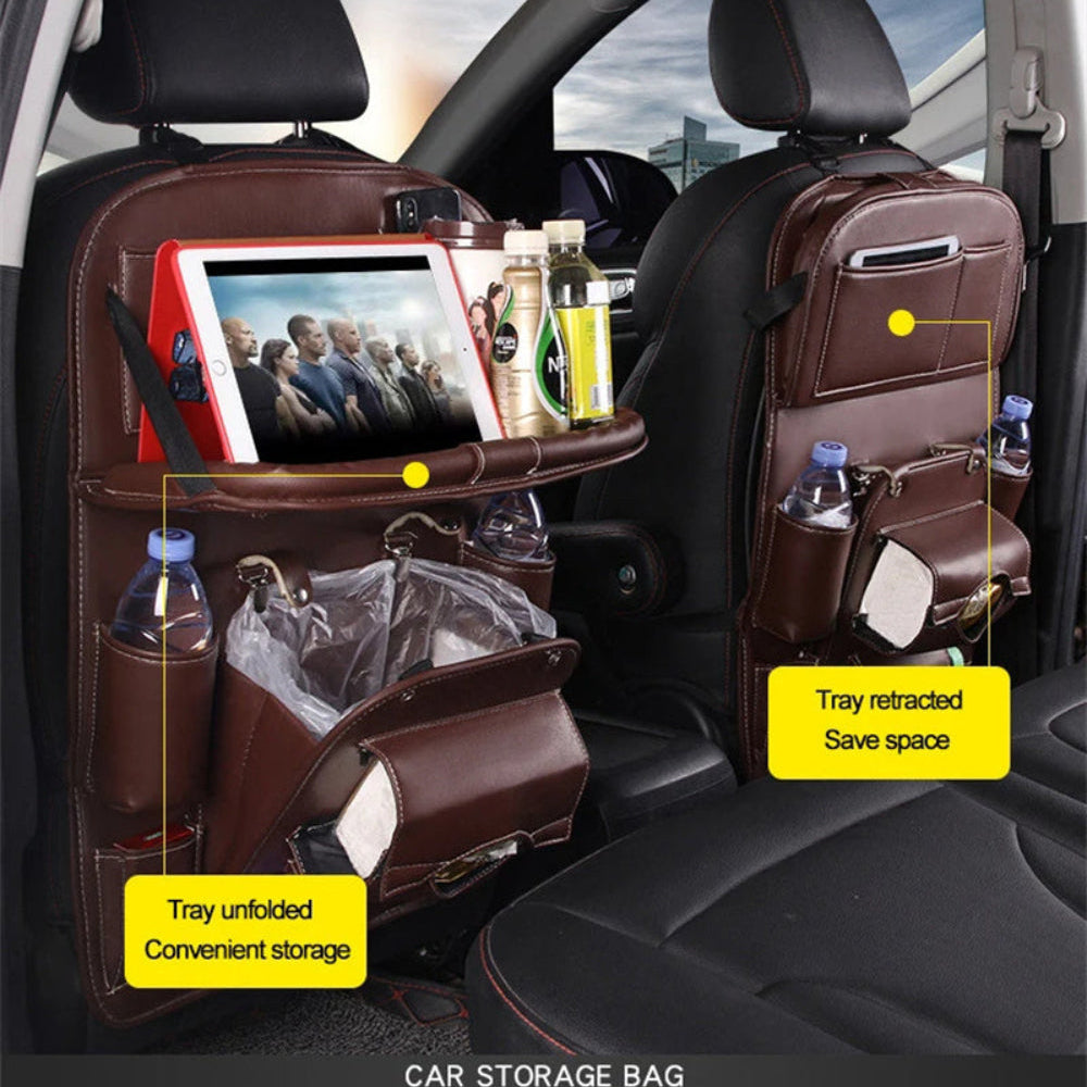 Brown PU-leather seat-back organizer showing the tray unfolded for storage on one seat and folded up to save space on the other.