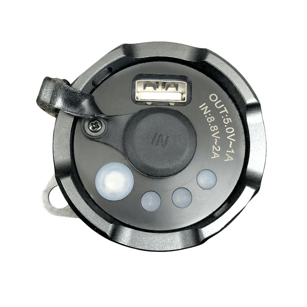 X10000 Destroyer flashlight tailcap showing open USB output port and labeled IN charging port