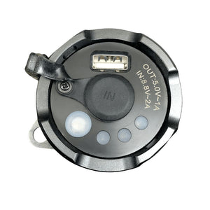 X10000 Destroyer flashlight tailcap showing open USB output port and labeled IN charging port