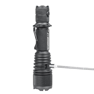 Powertac Warrior LT G5 flashlight standing vertically while a magnetic charging cable connects to the body.