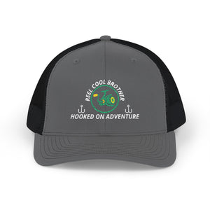 Reel Cool Brother embroidered trucker cap, front view, charcoal front with black mesh back