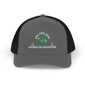 Reel Cool Mom embroidered trucker cap, front view, charcoal front with black mesh back
