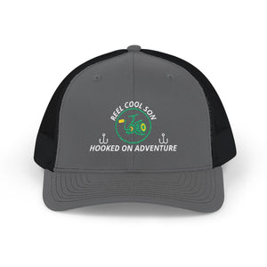 Reel Cool Son embroidered trucker cap, front view, charcoal front with black mesh back